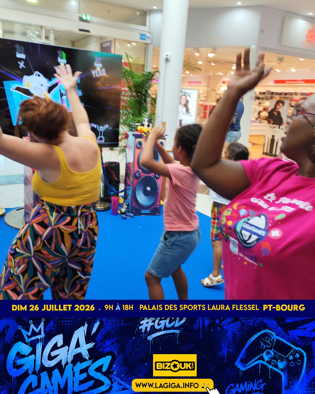 Family dance challenge on a giant screen